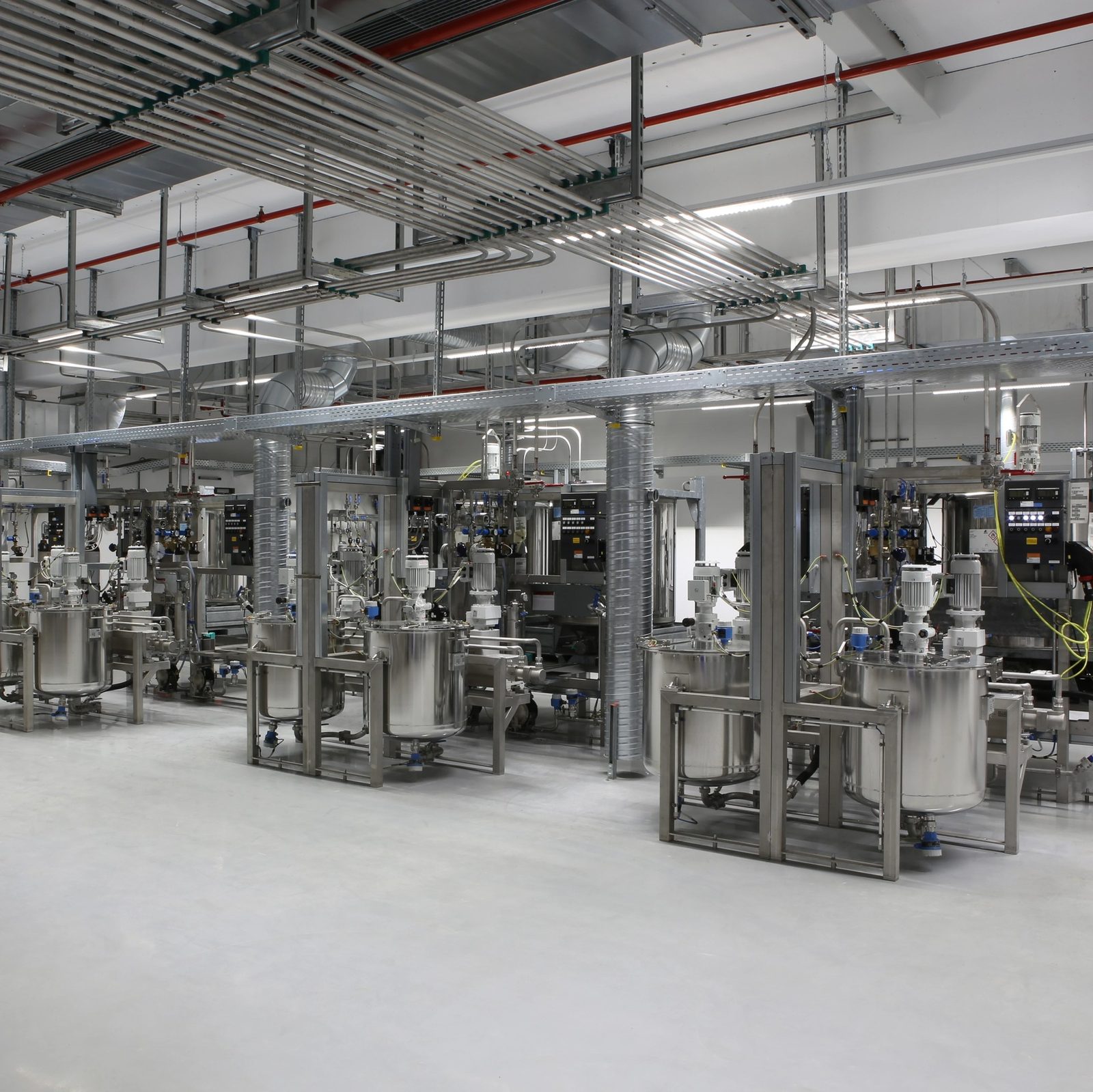Automotive paint mix room with dosing and circulation systems