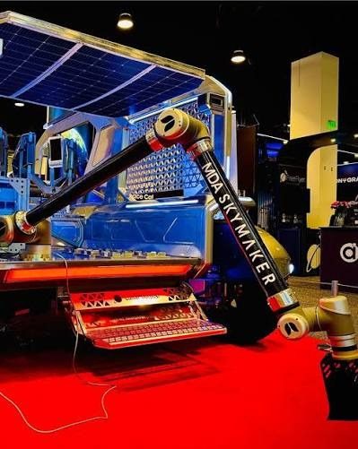 MDA SKYMAKER robotic arm mounted on a lunar rover at a trade show